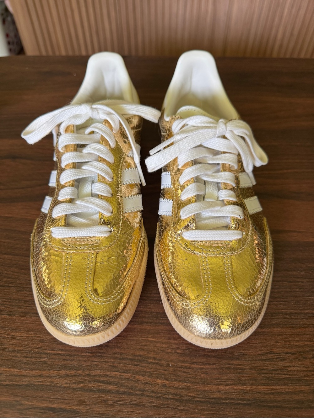 adidas Women's Metallic Gold Sneakers with White Stripes